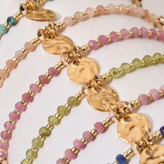 Adjustable 18ct gold plated disc with gemstones
