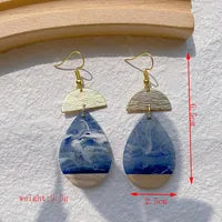 Resin & wood earrings blue